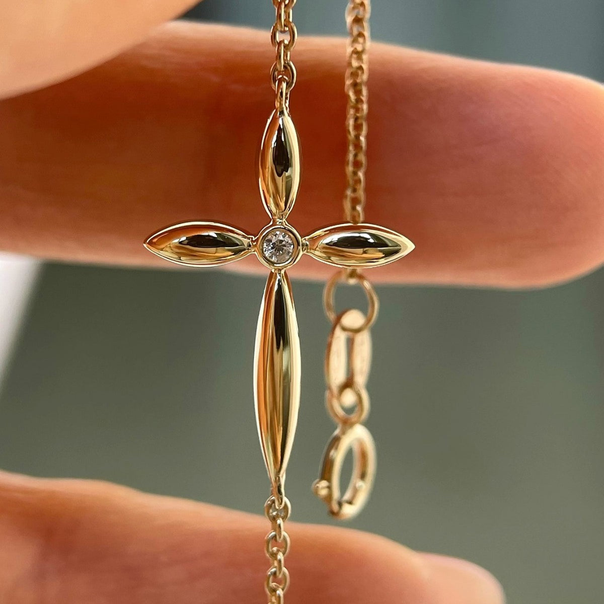 Adjustable Sterling Silver Cross Bracelet with Gold Plating